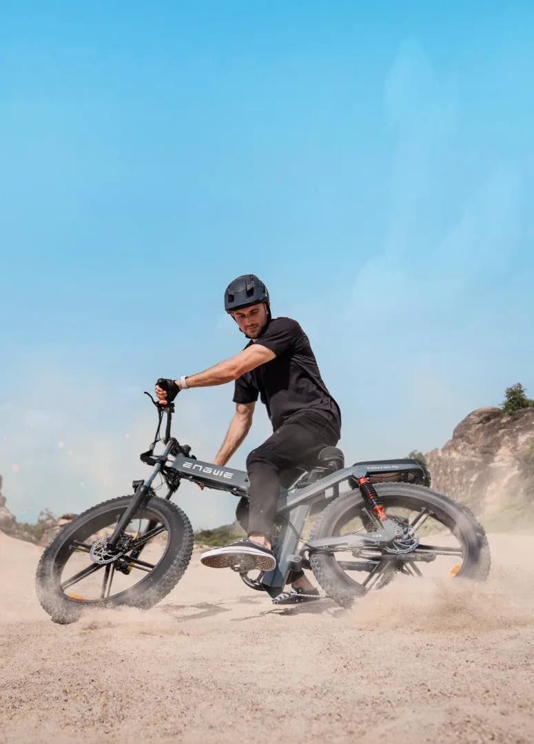 Engwe X20 Fat Tyre E-Bike in Black-offroading rider