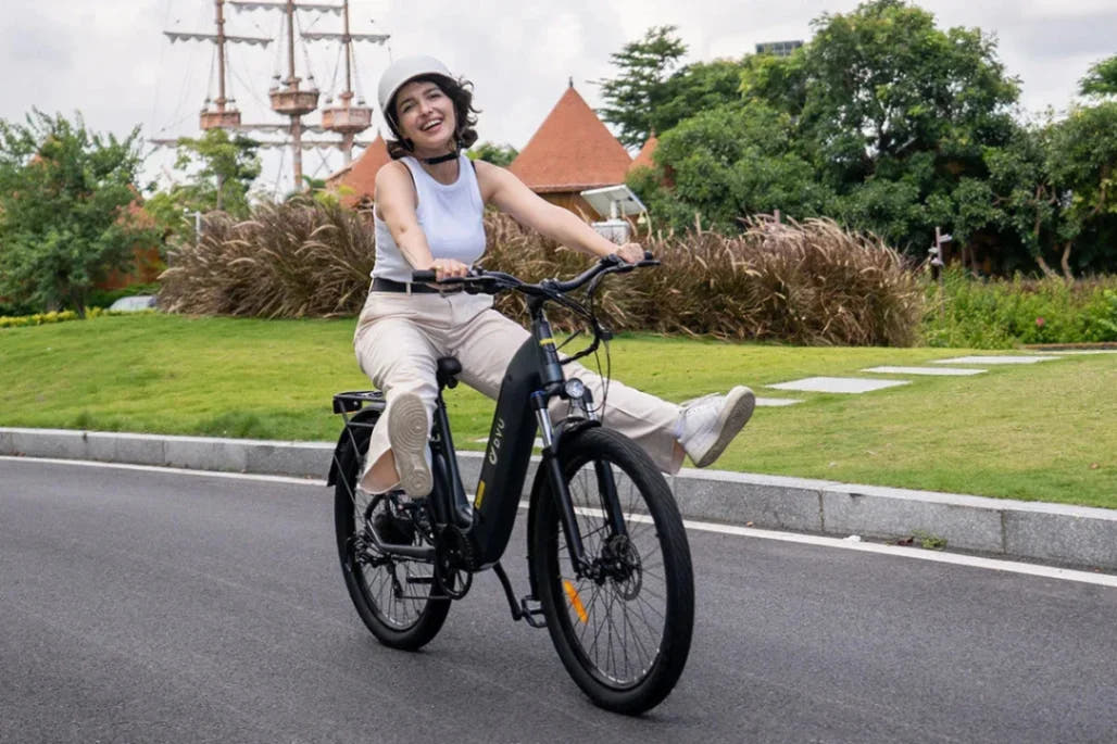 DYU C1 City E-Bike with rider on road